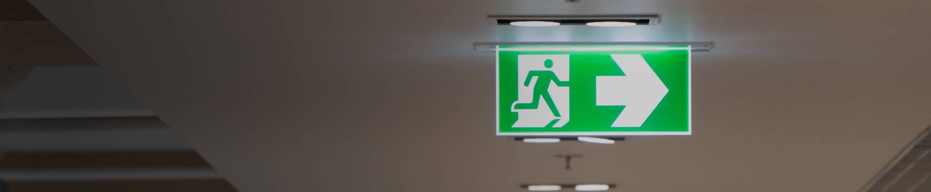 Photo of an emergency lighting sign after it was tested.